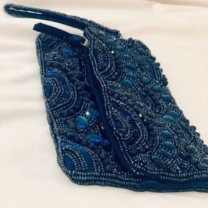 Sequined blue clutch. Slightly used.